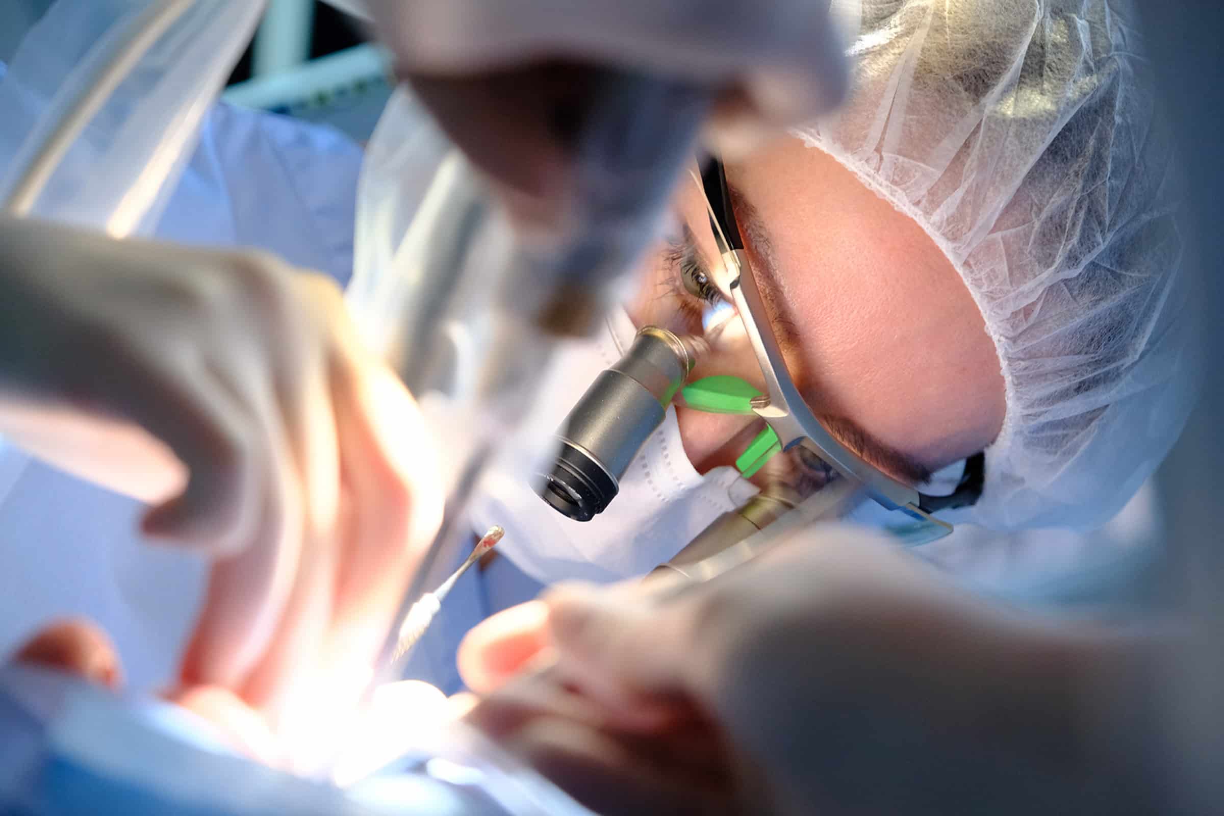 Dentist performing an All-on-4 implant procedure in Ridgeland, MS
