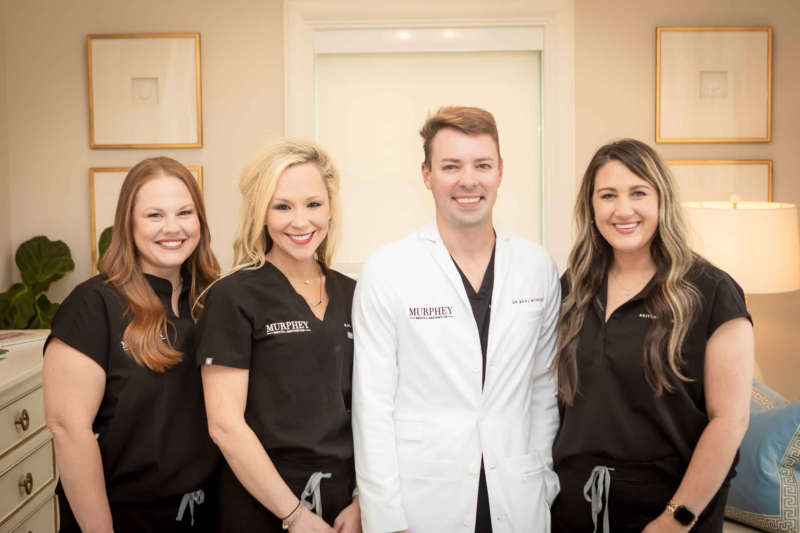 Murphey Dental Aesthetics team photo with dr murphey, office manager, dental assistant