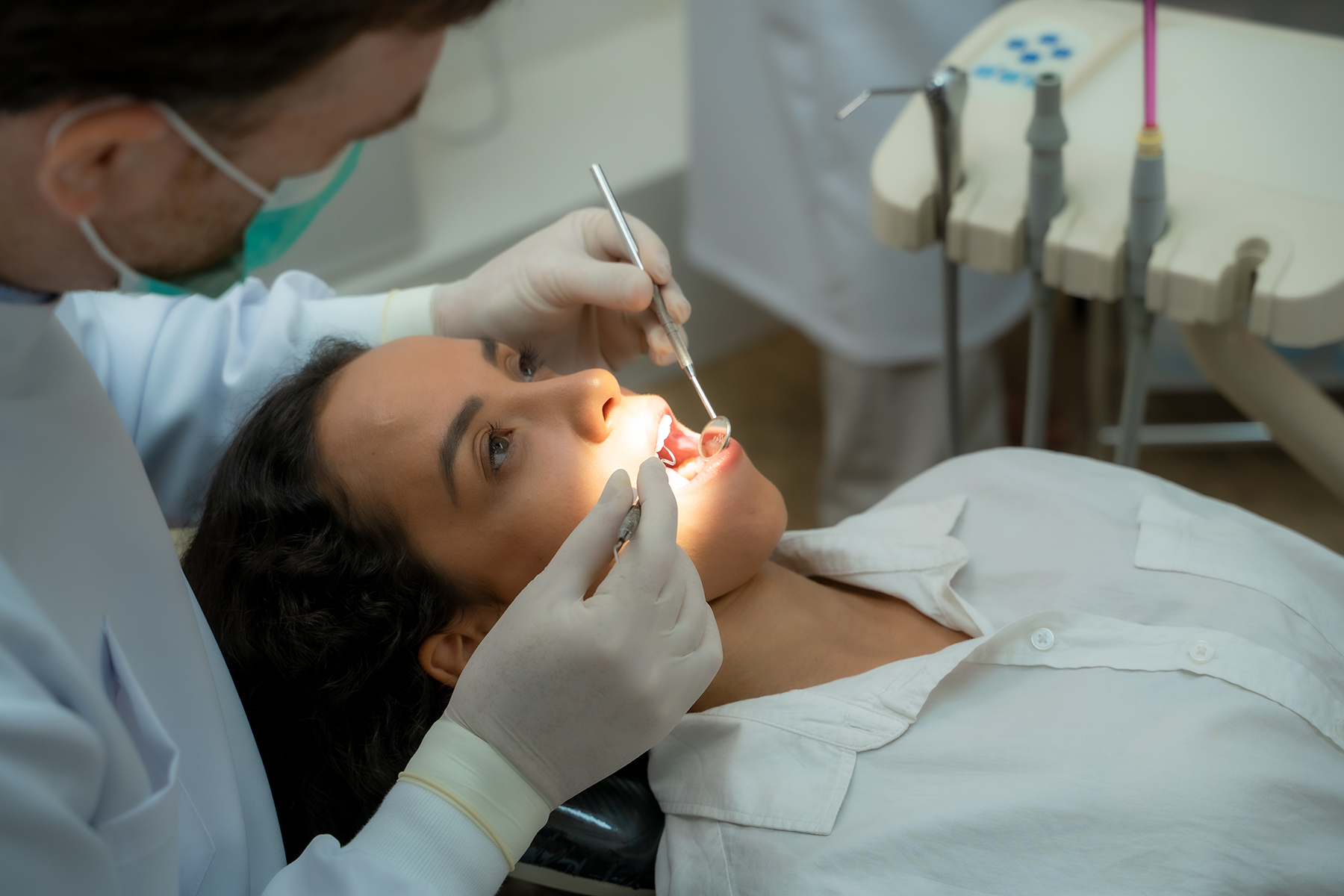 Woman getting a dental exam in Ridgeland, MS