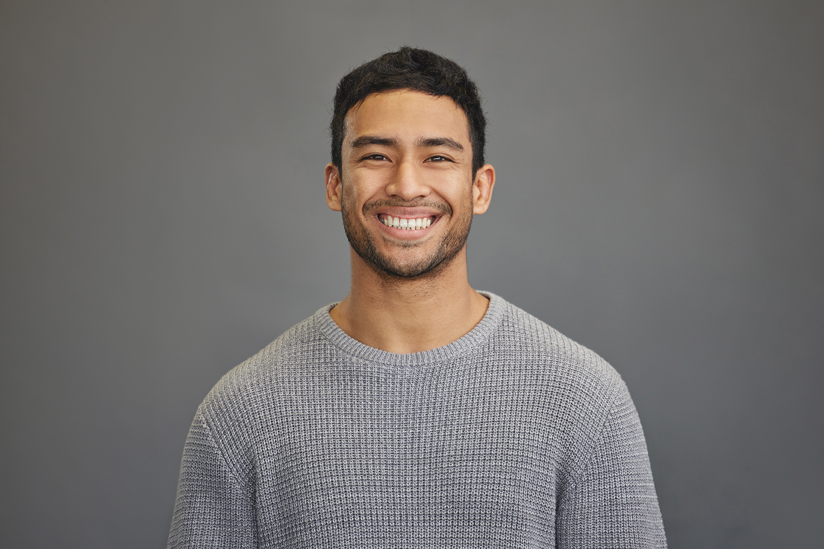 man smiling after oral cancer exam at murphey dental aesthetics